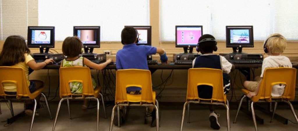 Elementary school students using computers